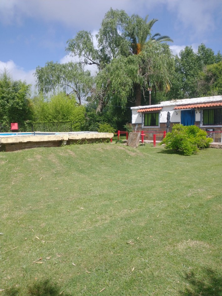 Gran terreno con casa 3 amb y pileta, ubicado en Juan Bautista Alberdi y Bouchard , San Vicente