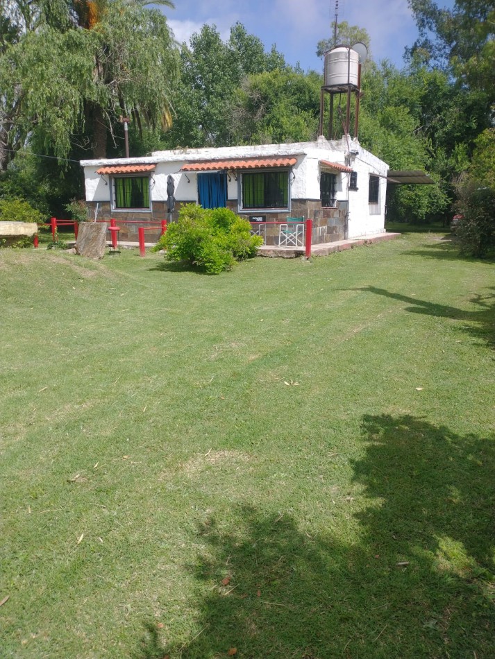 Gran terreno con casa 3 amb y pileta, ubicado en Juan Bautista Alberdi y Bouchard , San Vicente