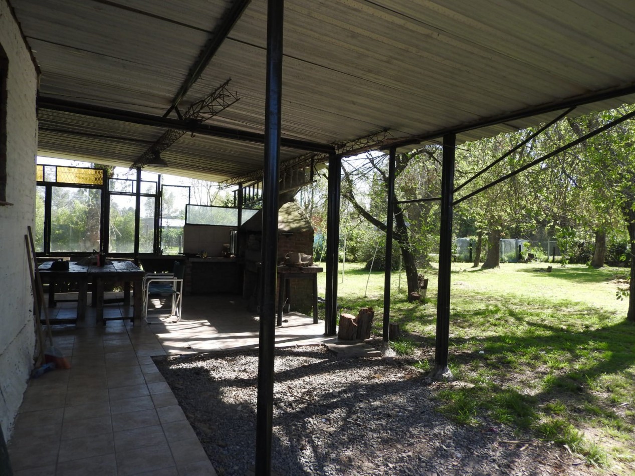 Gran terreno con casa 3 amb y pileta, ubicado en Juan Bautista Alberdi y Bouchard , San Vicente