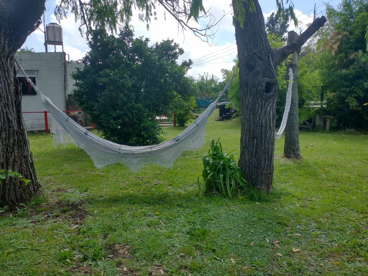 Gran terreno con casa 3 amb y pileta, ubicado en Juan Bautista Alberdi y Bouchard , San Vicente